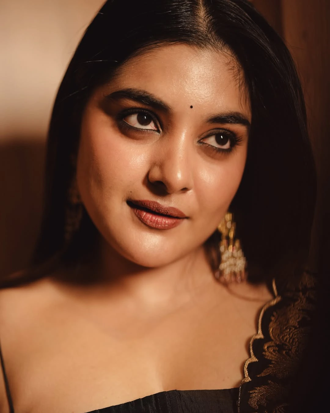 Nivetha Thomas Cute Photos in Black Dress