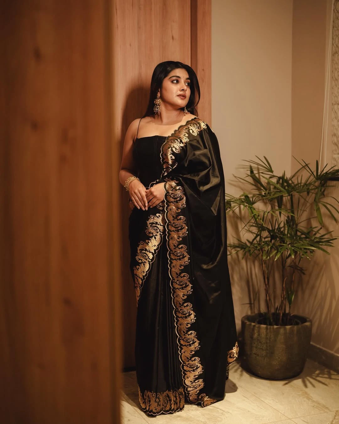 Nivetha Thomas Cute Photos in Black Dress