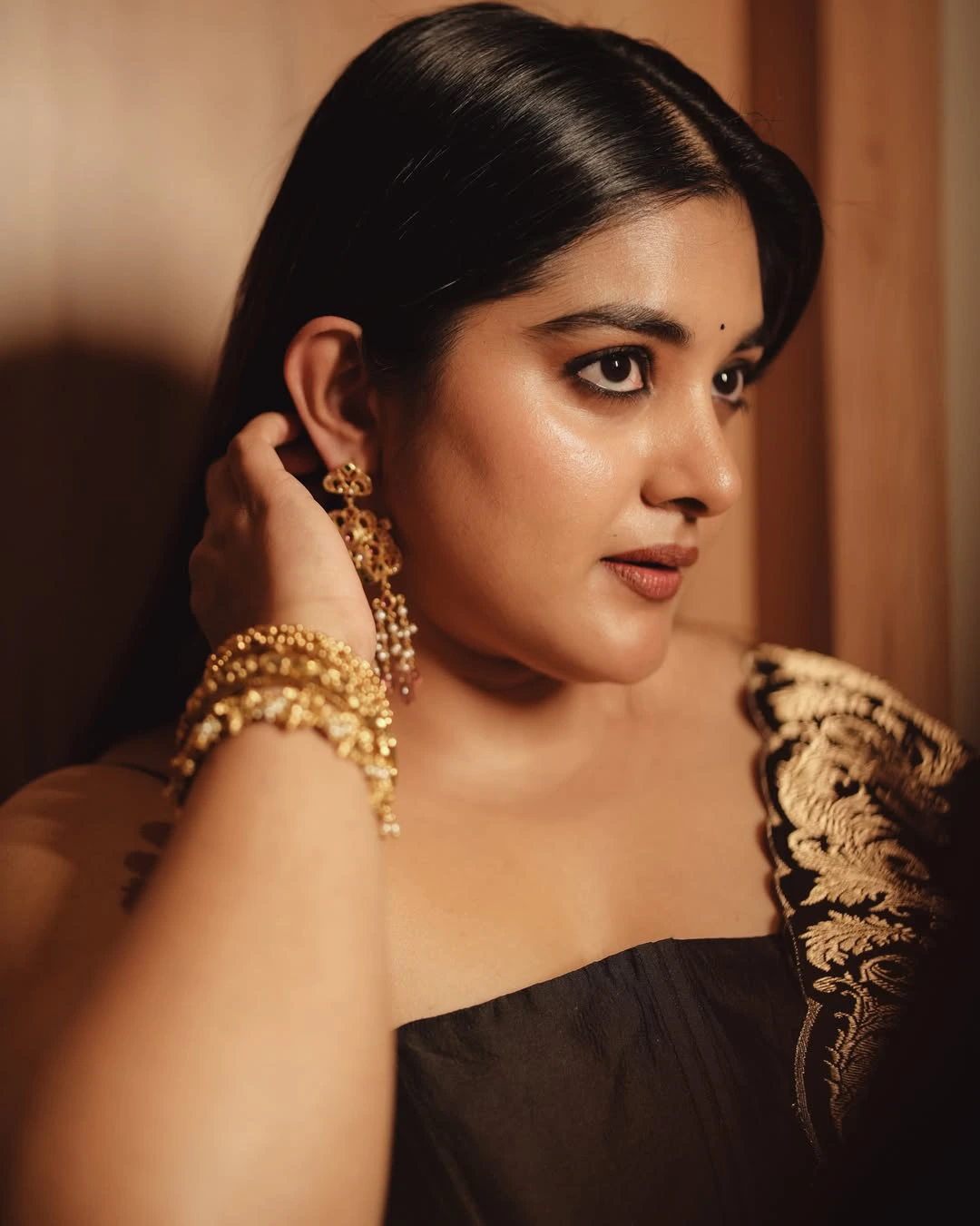 Nivetha Thomas Cute Photos in Black Dress