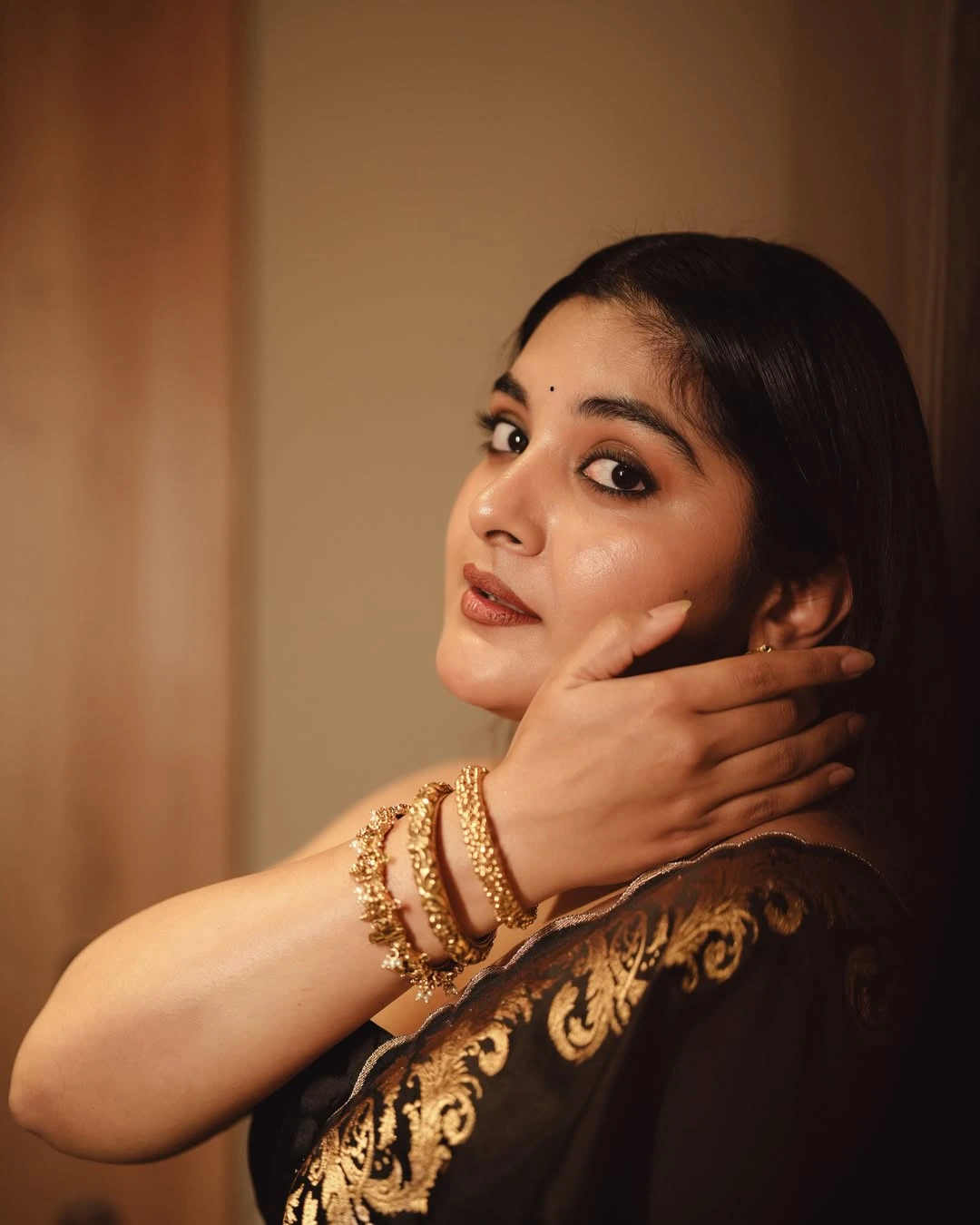 Nivetha Thomas Cute Photos in Black Dress