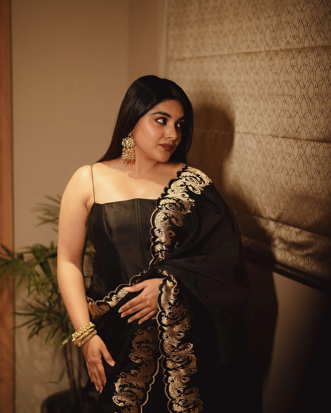 Nivetha Thomas Cute Photos in Black Dress