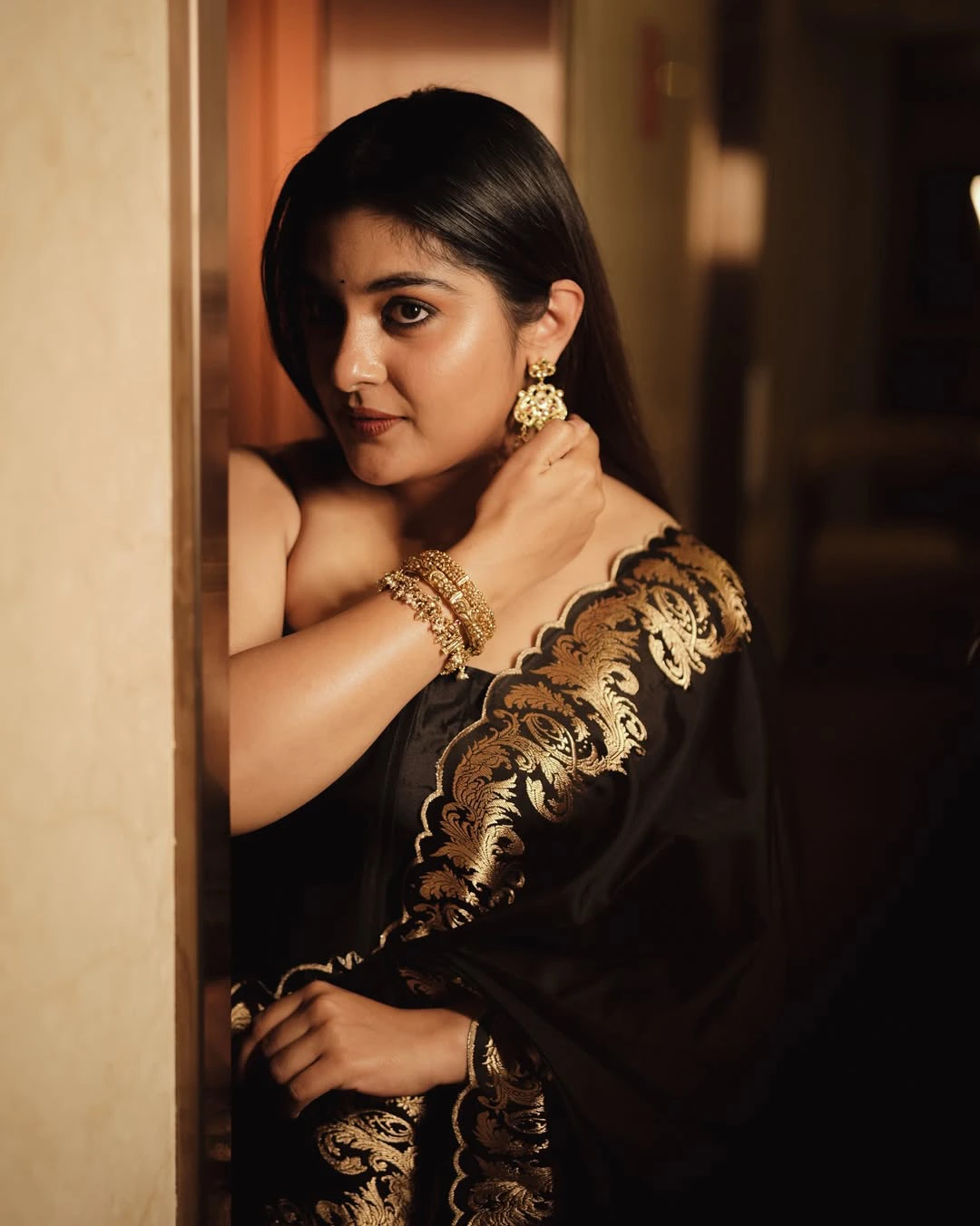 Nivetha Thomas Cute Photos in Black Dress