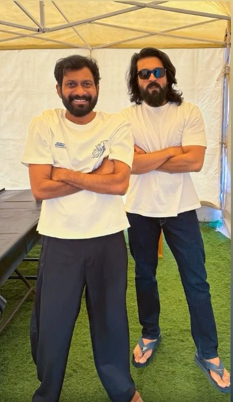 Ram Charan Buchibabu Sana Photos from Peddi Sets