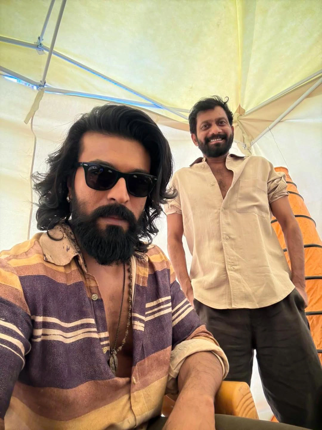 Ram Charan Buchibabu Sana Photos from Peddi Sets