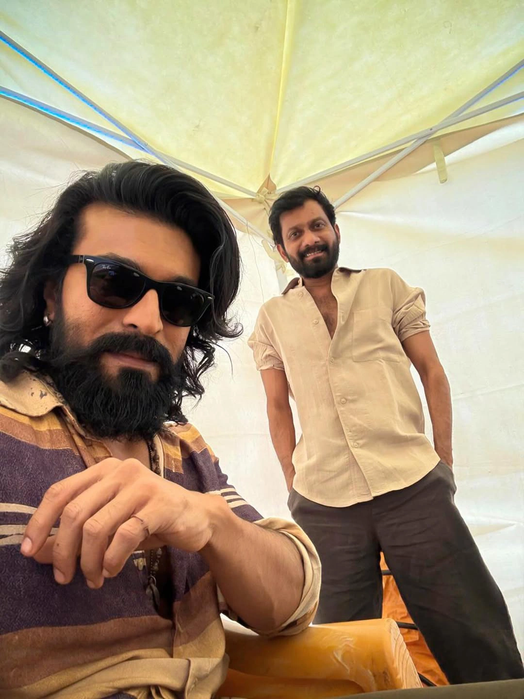 Ram Charan Buchibabu Sana Photos from Peddi Sets