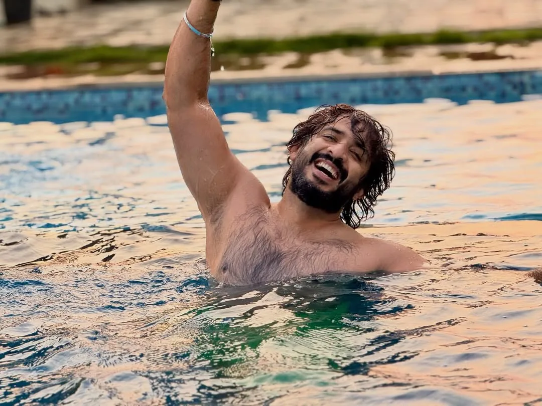 anchor ravi family enjoying in swimming pool