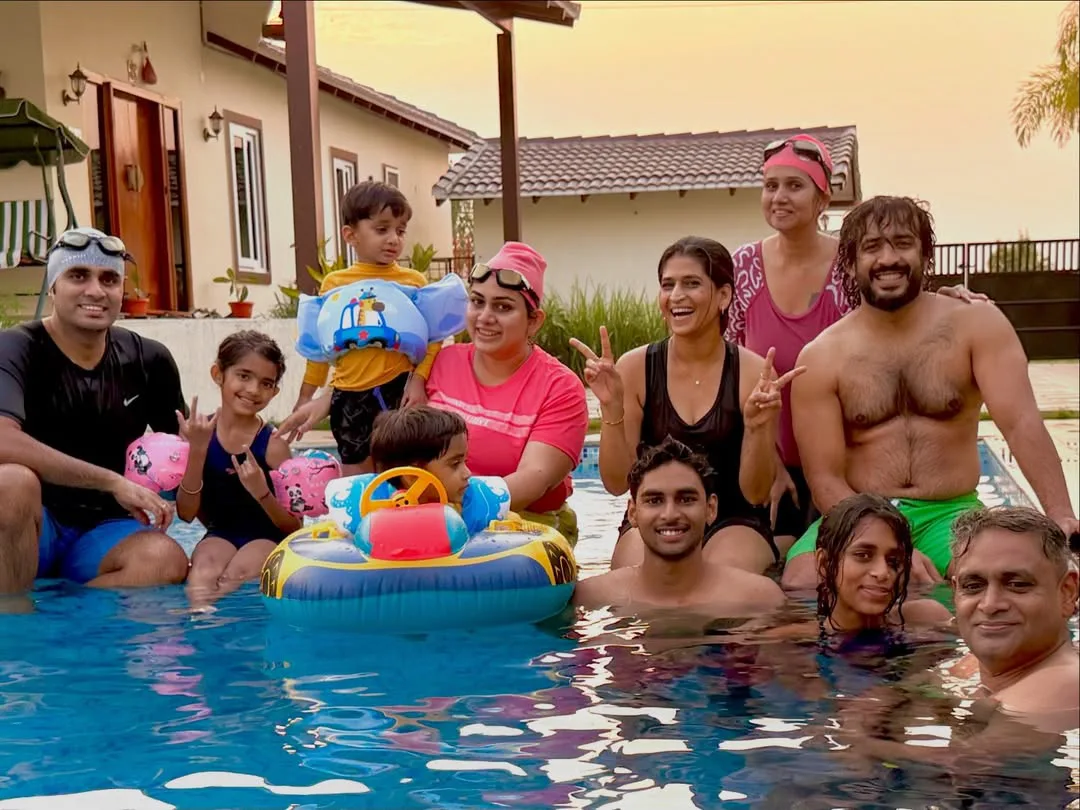 anchor ravi family enjoying in swimming pool