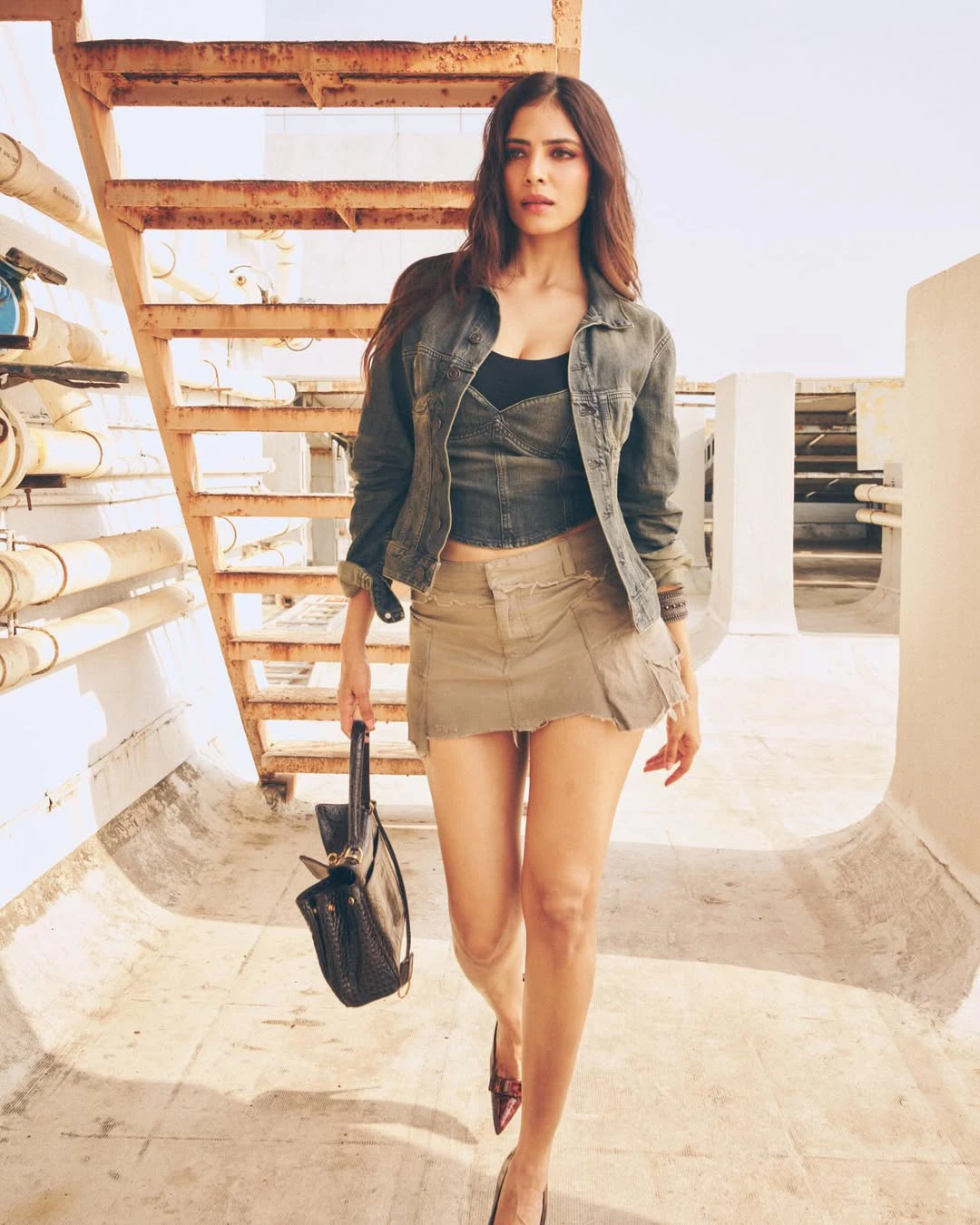 Malavika Mohanan Poses in Short Skirt