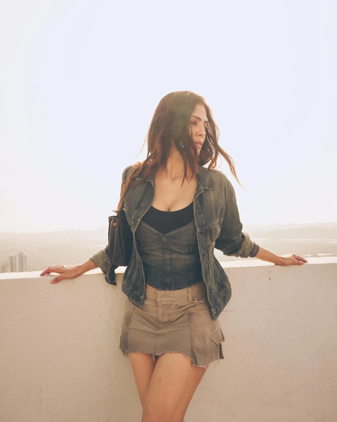 Malavika Mohanan Poses in Short Skirt