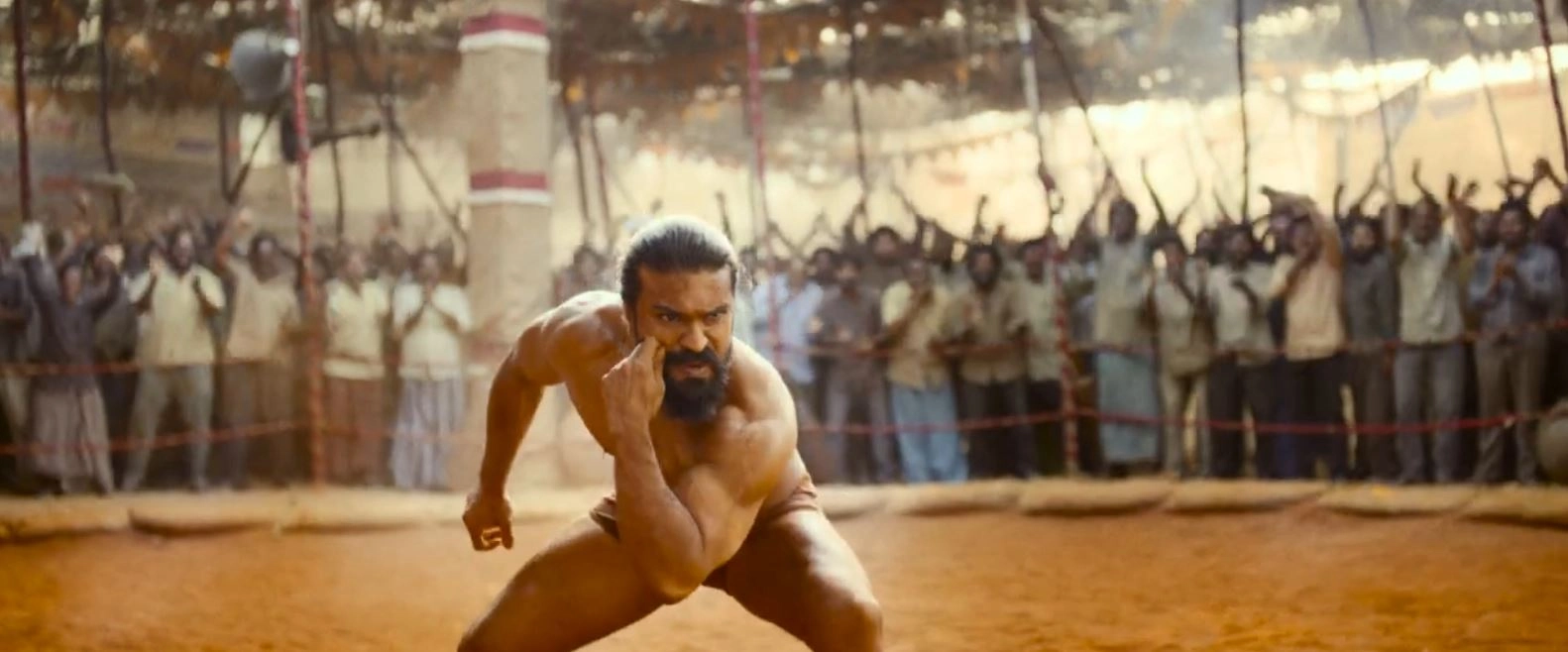 Ram Charan Photos From Peddi Trailer