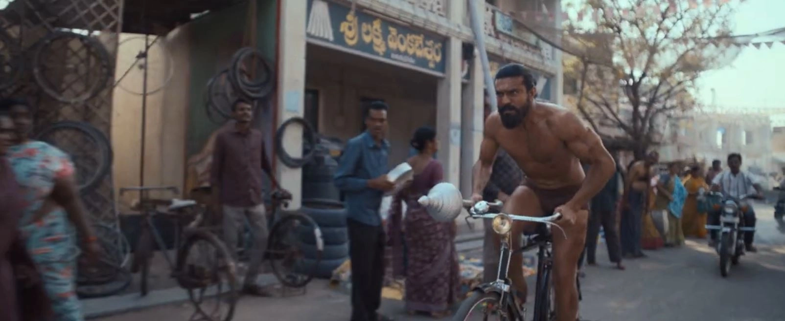 Ram Charan Photos From Peddi Trailer