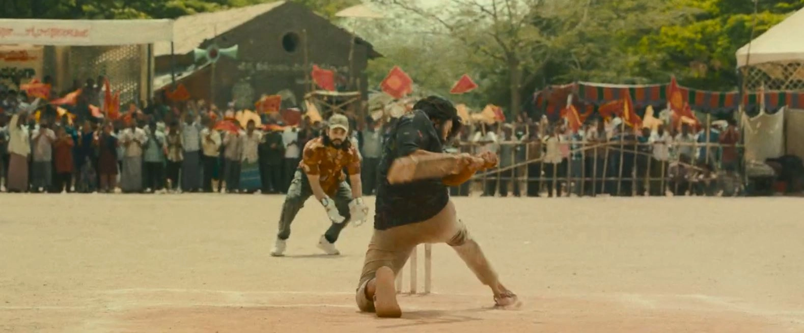 Ram Charan Photos From Peddi Trailer