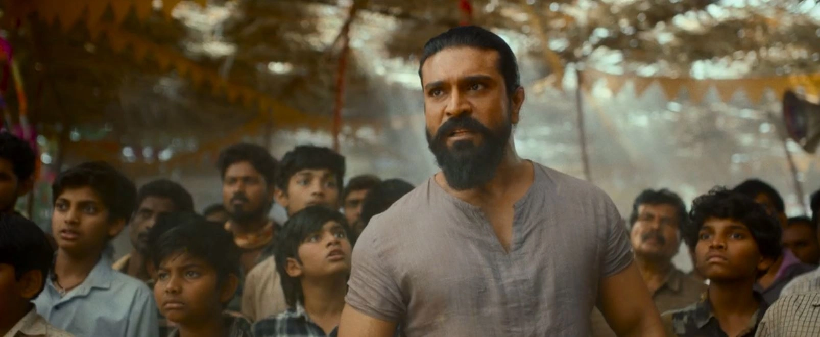 Ram Charan Photos From Peddi Trailer