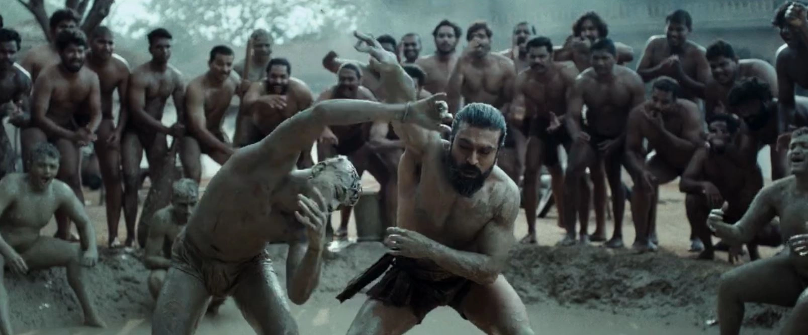 Ram Charan Photos From Peddi Trailer