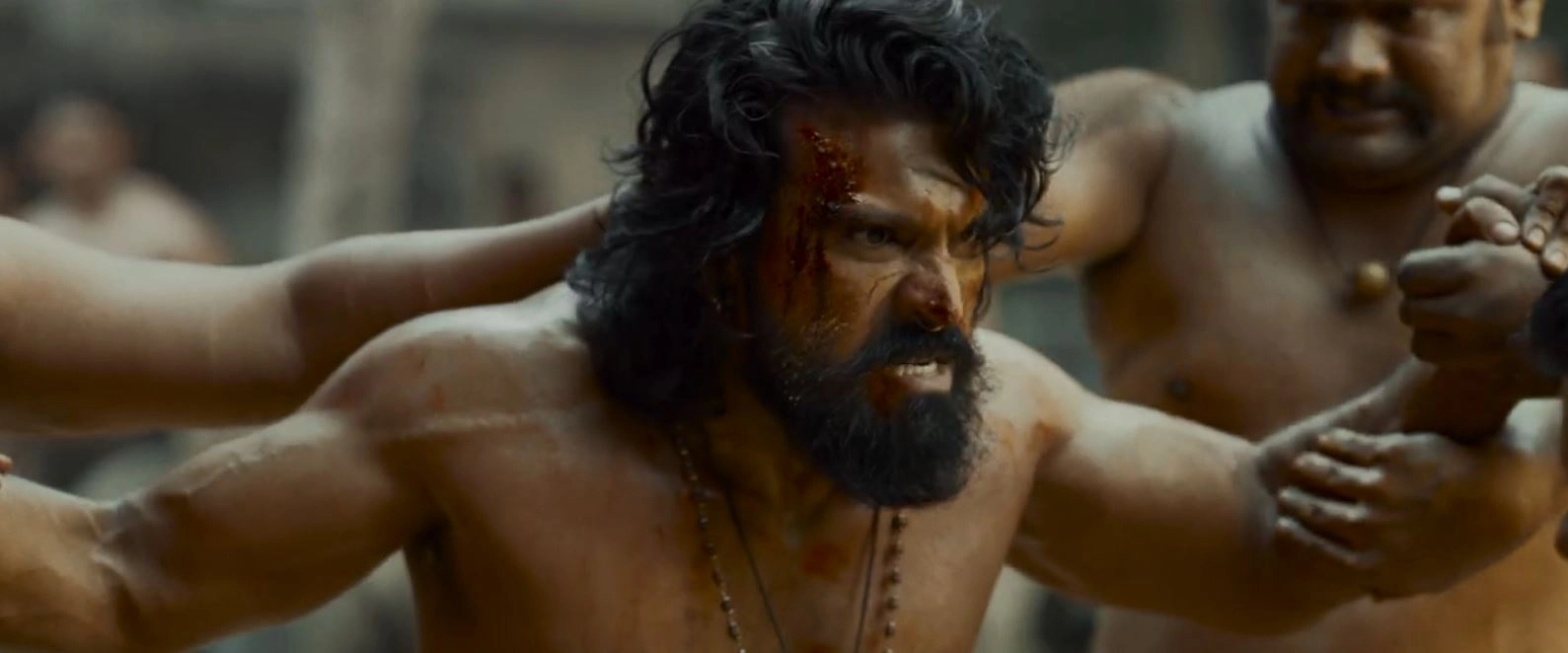 Ram Charan Photos From Peddi Trailer