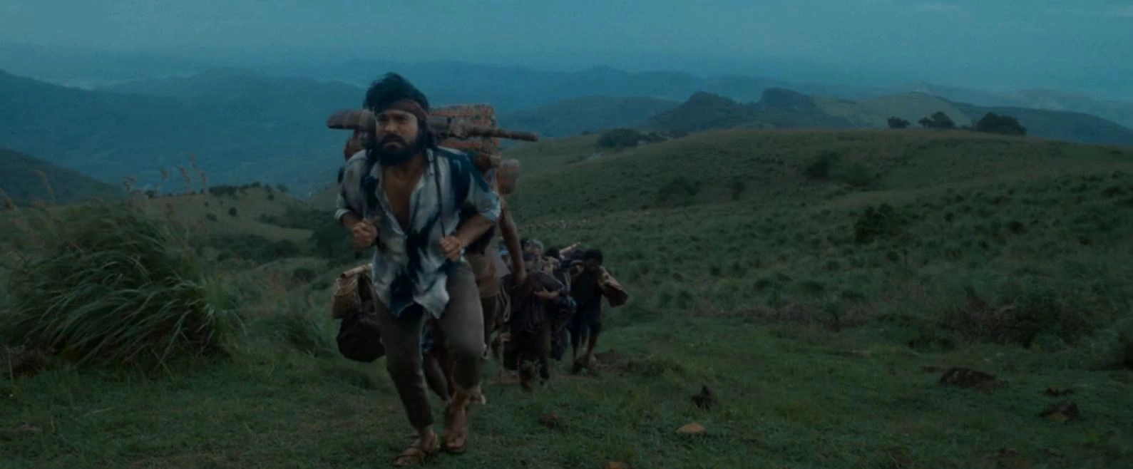 Ram Charan Photos From Peddi Trailer