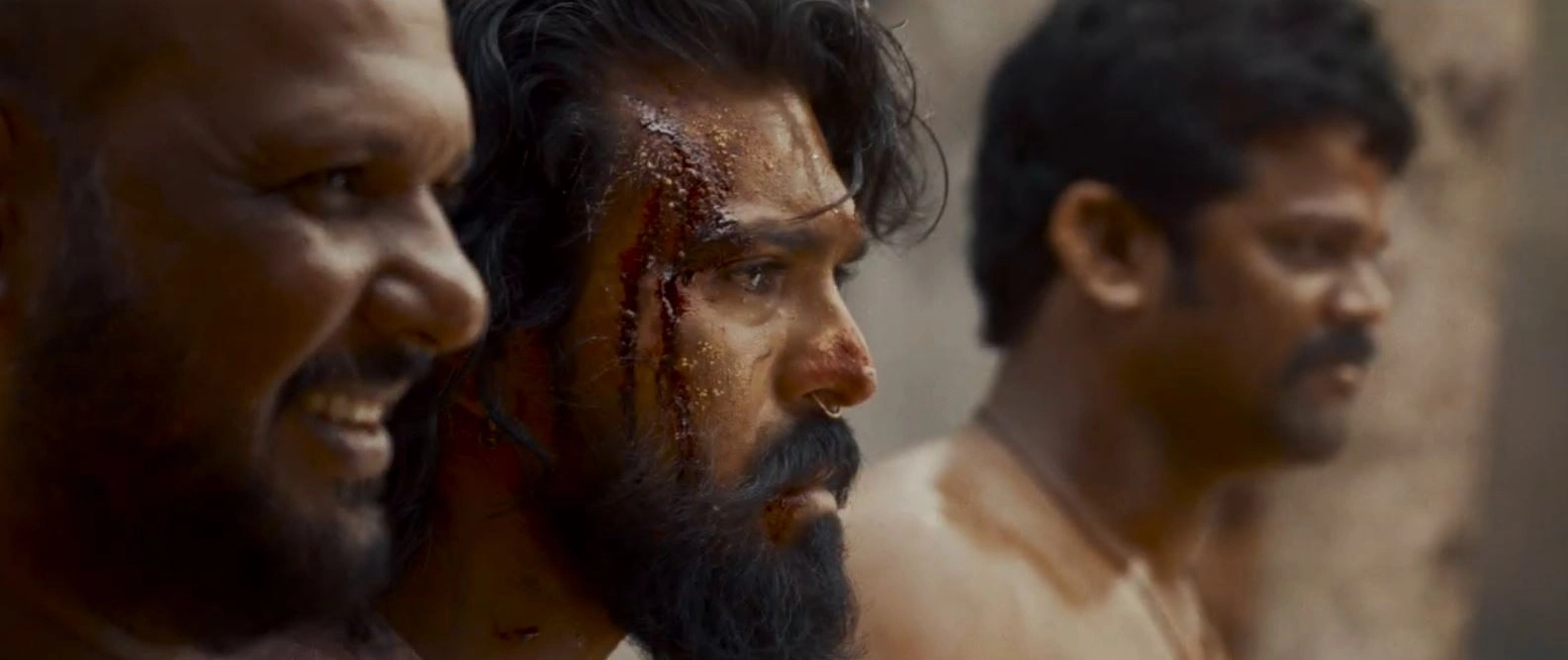Ram Charan Photos From Peddi Trailer