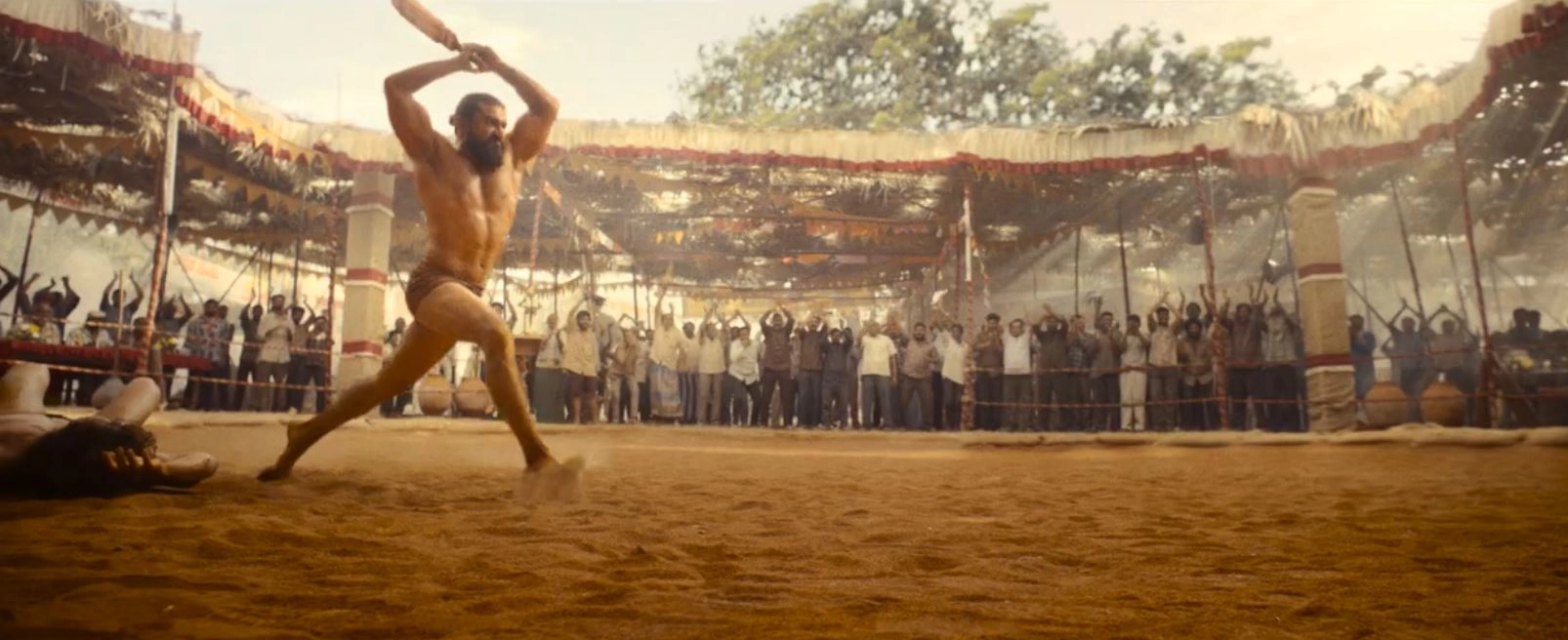 Ram Charan Photos From Peddi Trailer