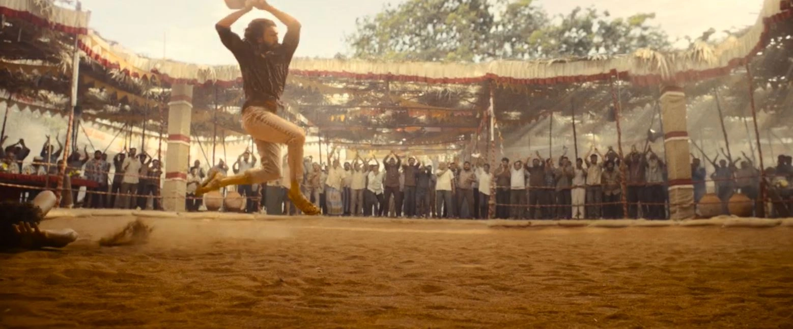 Ram Charan Photos From Peddi Trailer