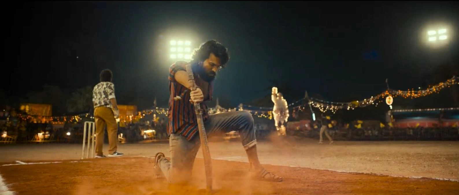 Ram Charan Photos From Peddi Trailer