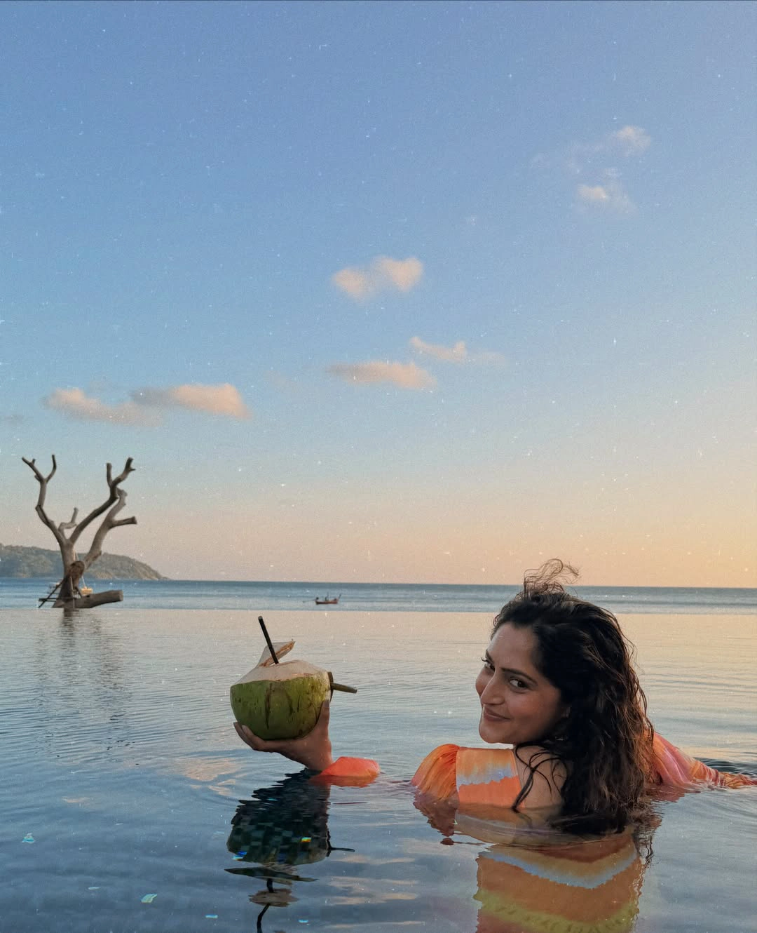 Reba Monica John Shares Baby Bump Photos from Thailand