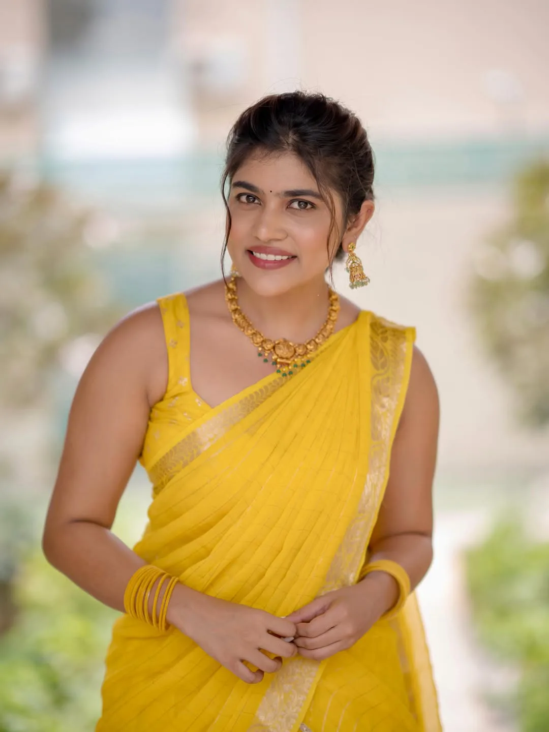 bigg boss fame rithu chowdary stunning looks in yellow dress