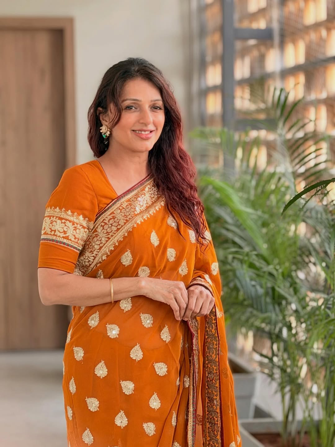 Pawan kalyan Heroine Bhumika Chawla stunning looks in orange saree