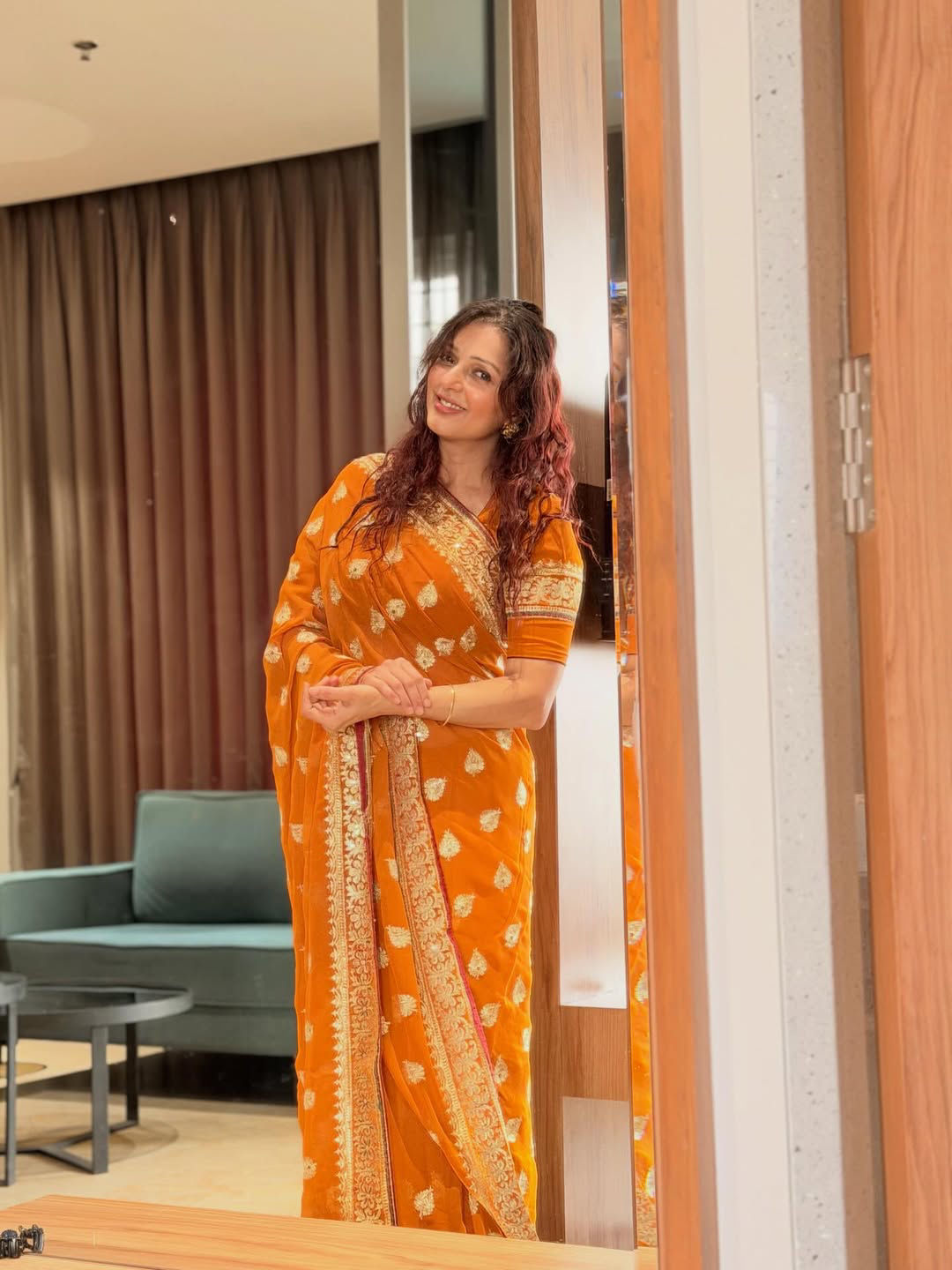 Pawan kalyan Heroine Bhumika Chawla stunning looks in orange saree