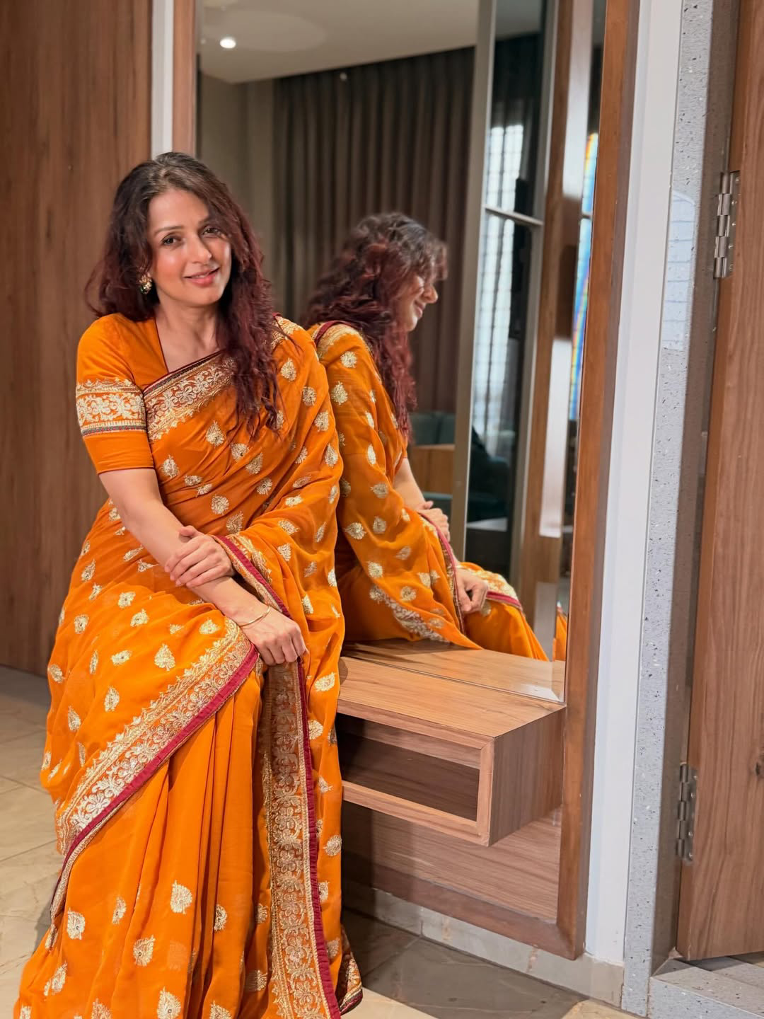 Pawan kalyan Heroine Bhumika Chawla stunning looks in orange saree