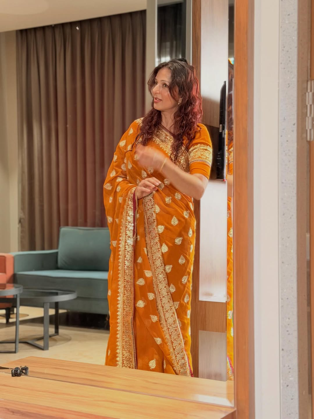 Pawan kalyan Heroine Bhumika Chawla stunning looks in orange saree