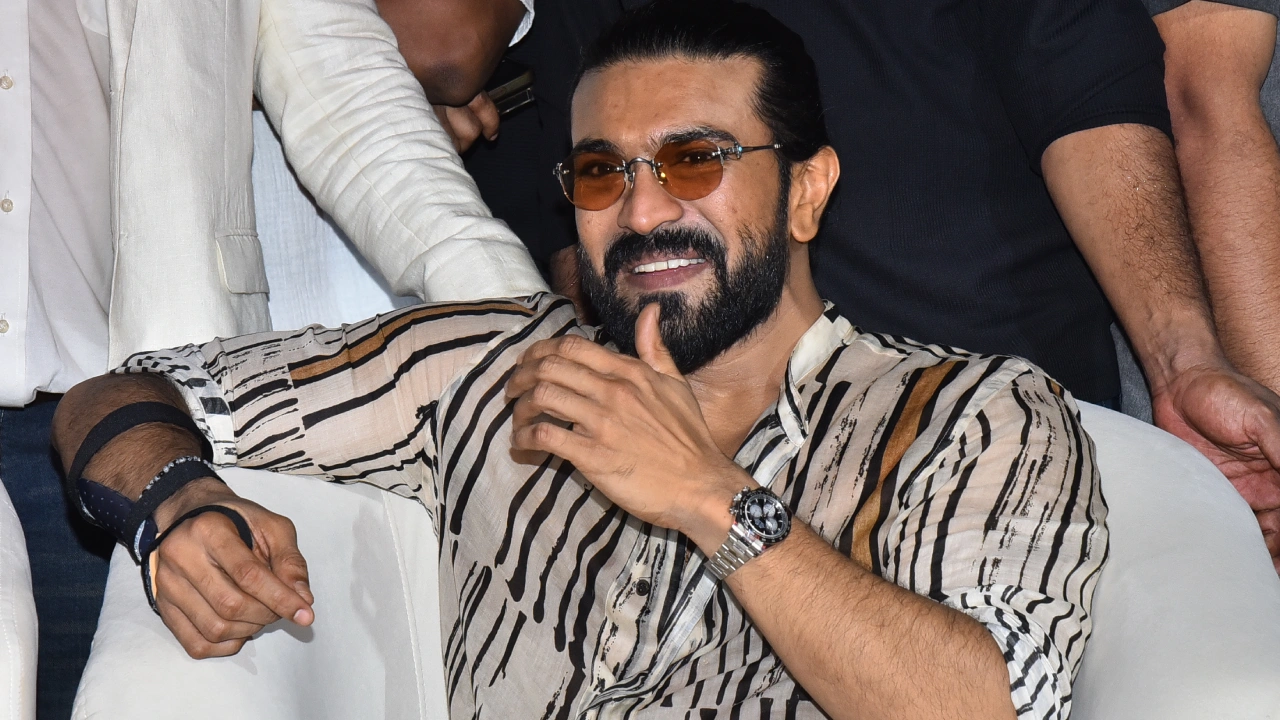 Ram Charan Photos from Peddi Pre Release Event