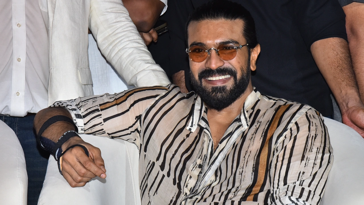 Ram Charan Photos from Peddi Pre Release Event