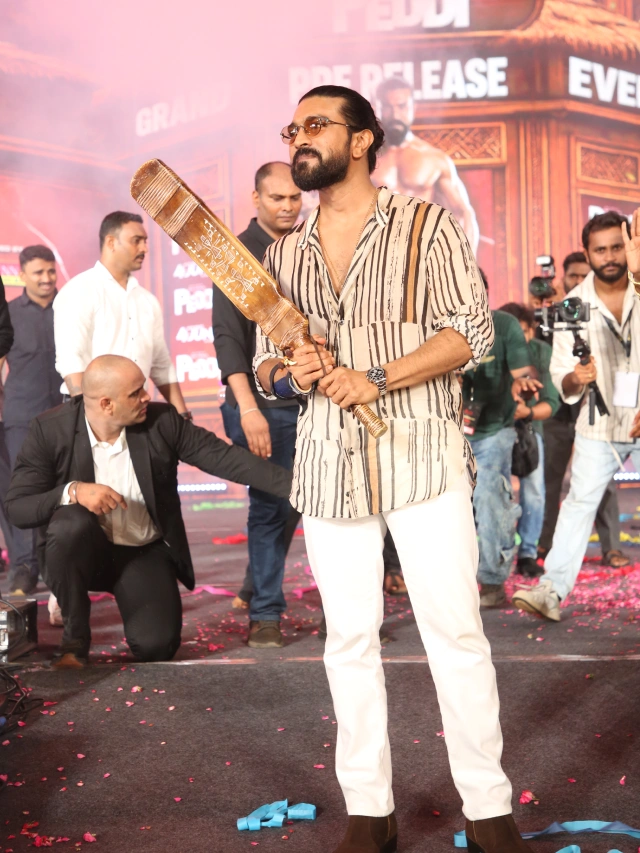 Ram Charan Photos from Peddi Pre Release Event