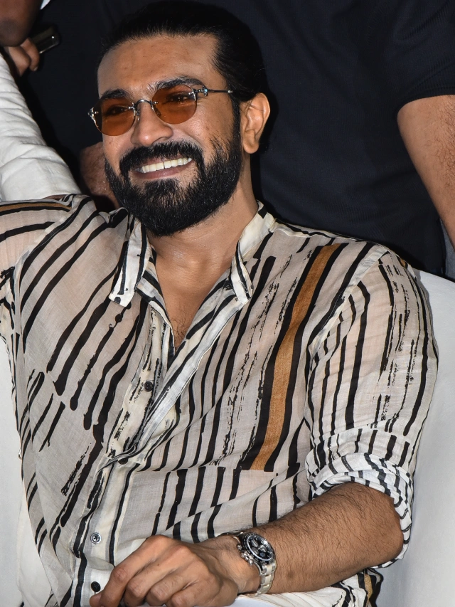 Ram Charan Photos from Peddi Pre Release Event