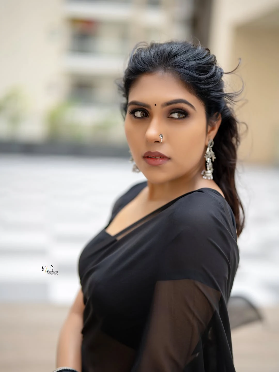 Satya Sri Stunning Looks in Black Saree