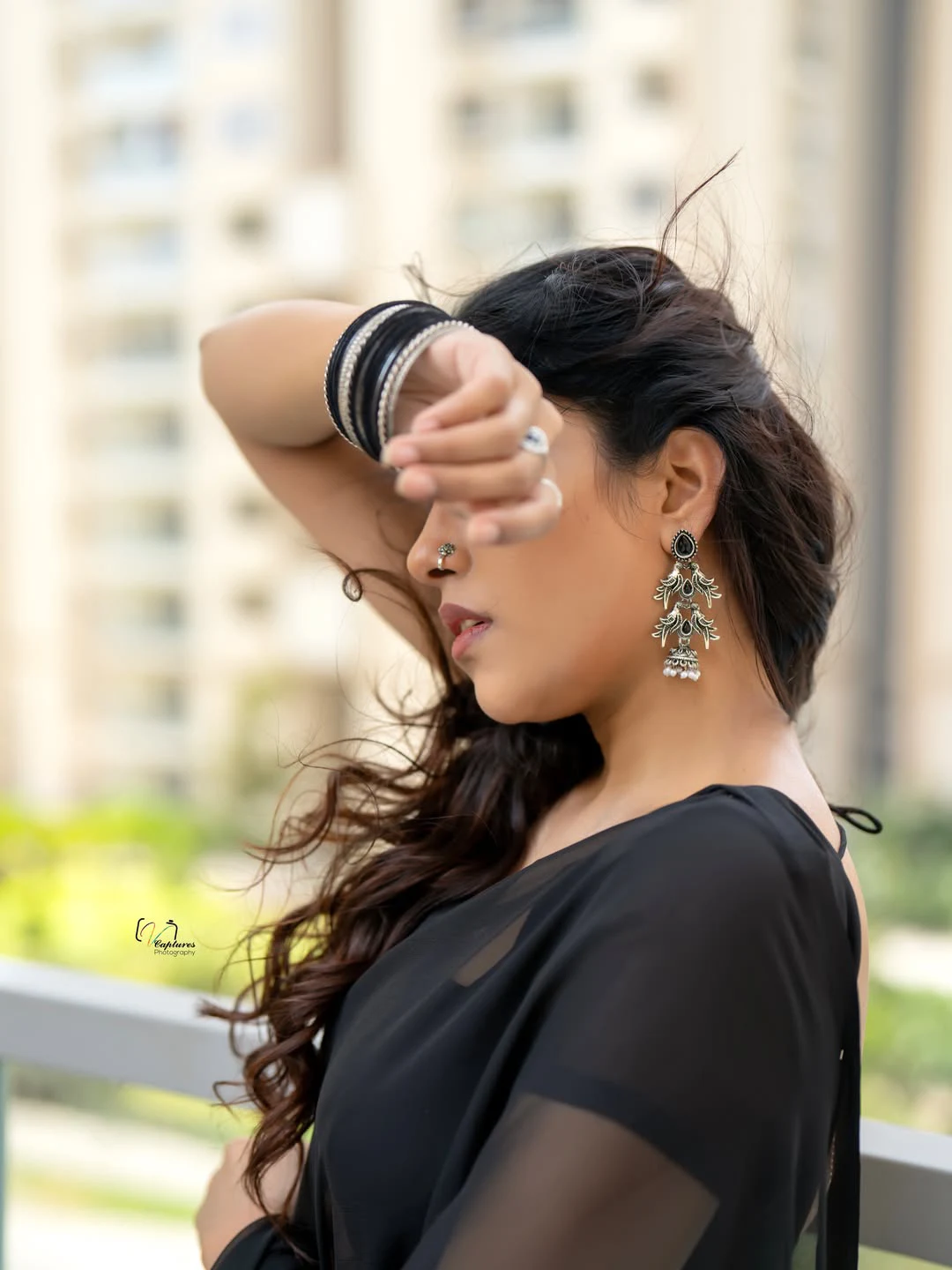 Satya Sri Stunning Looks in Black Saree