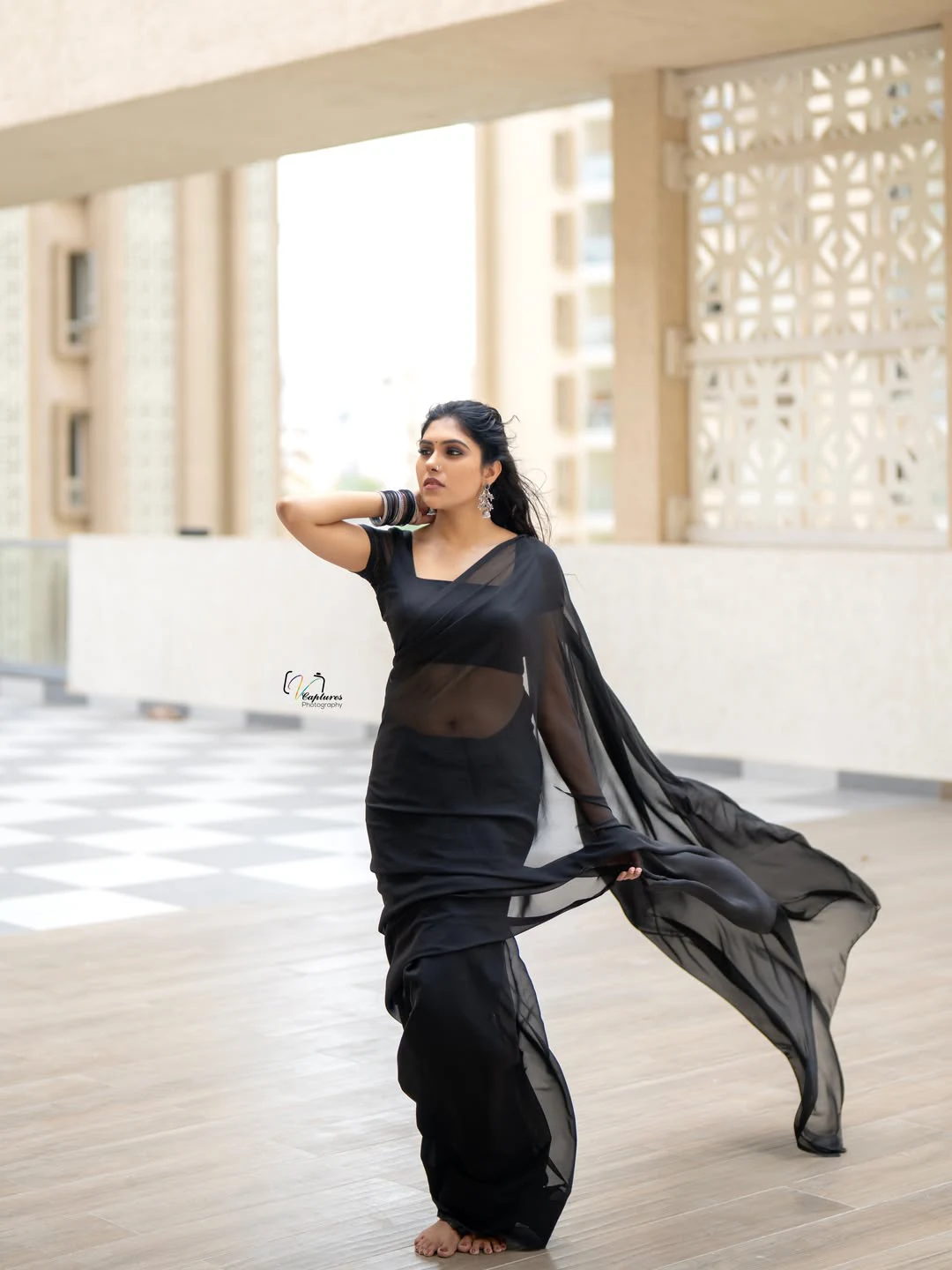 Satya Sri Stunning Looks in Black Saree