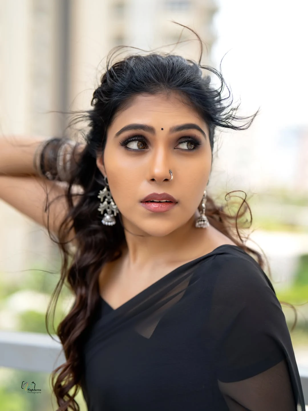 Satya Sri Stunning Looks in Black Saree