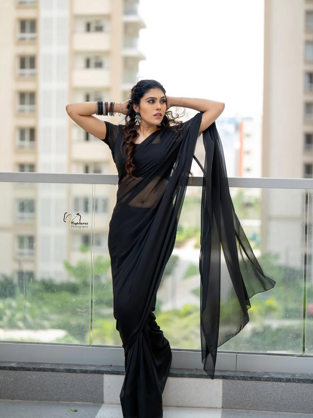 Satya Sri Stunning Looks in Black Saree