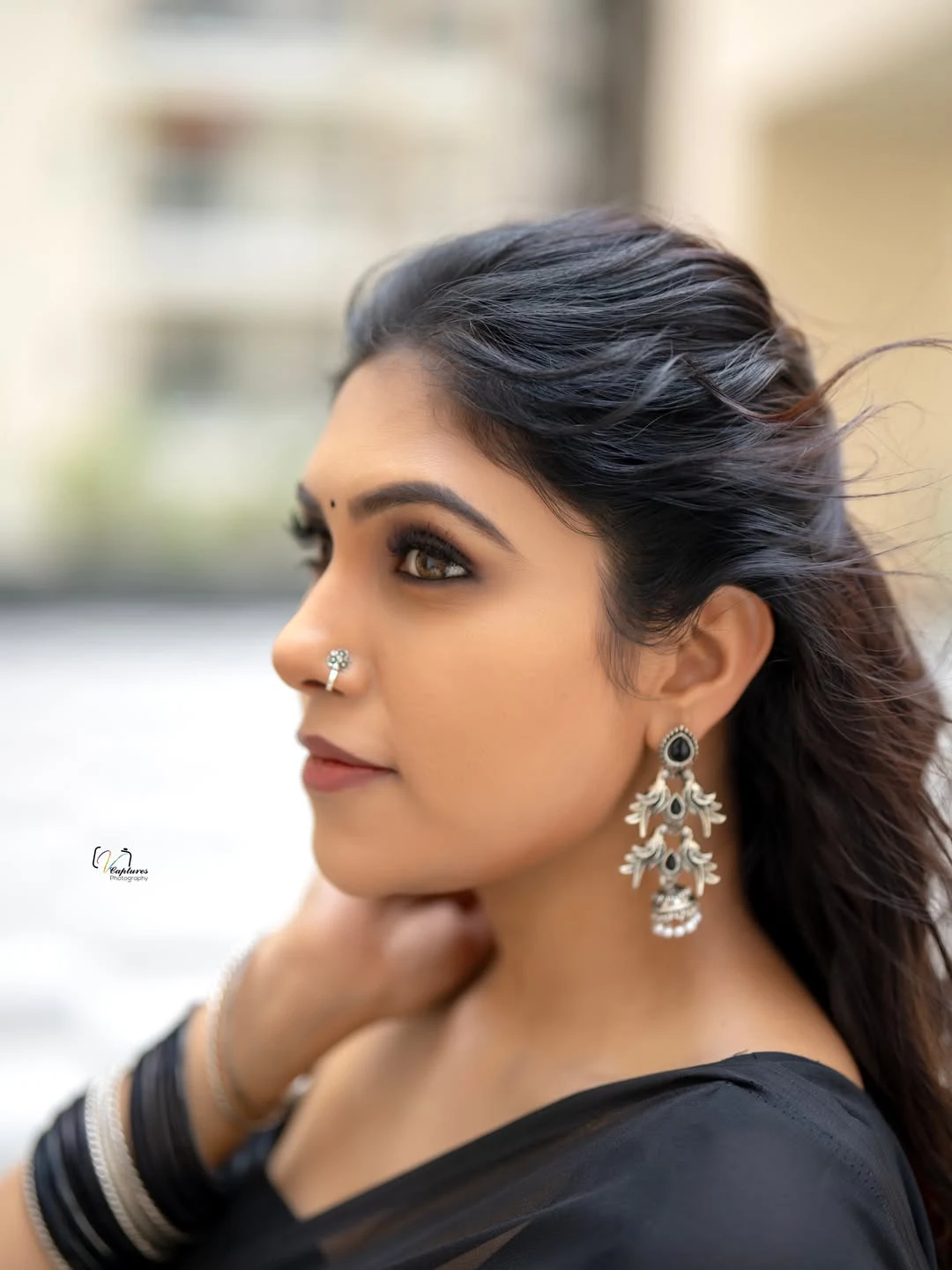 Satya Sri Stunning Looks in Black Saree