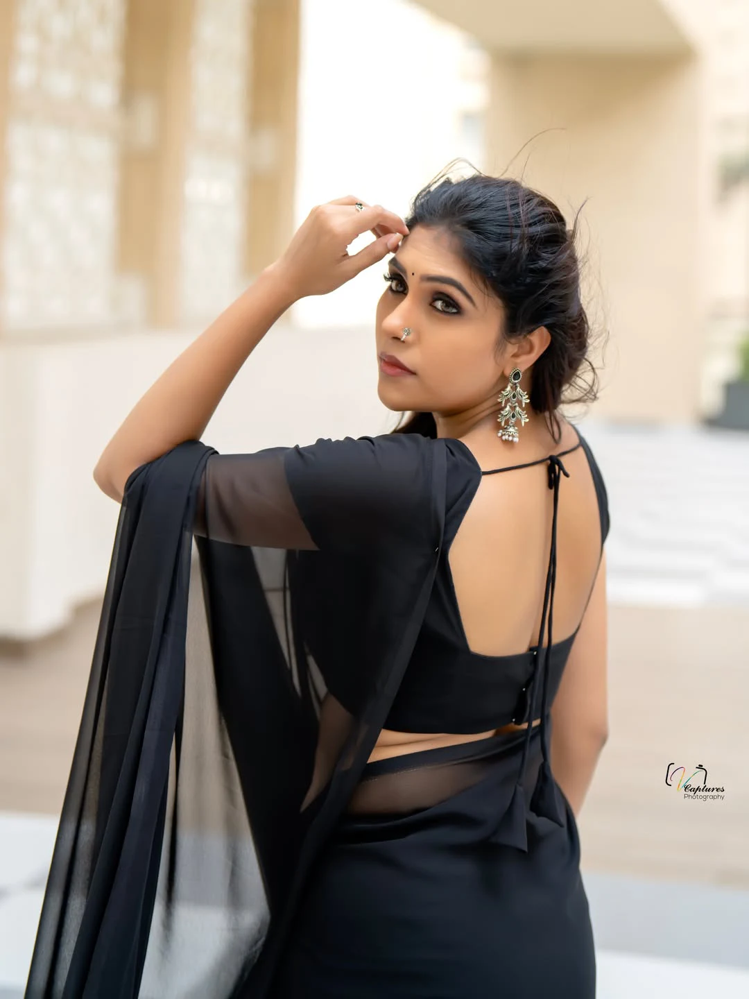 Satya Sri Stunning Looks in Black Saree