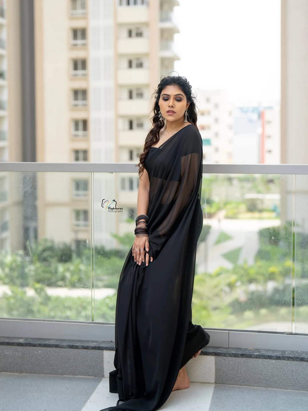 Satya Sri Stunning Looks in Black Saree