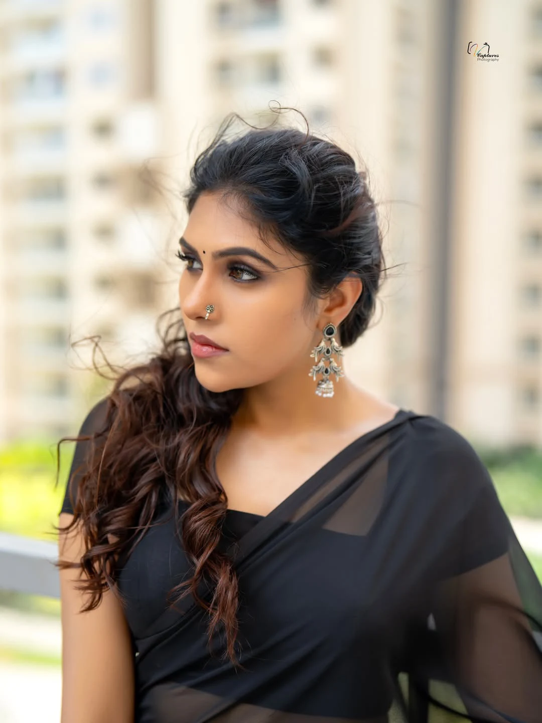 Satya Sri Stunning Looks in Black Saree