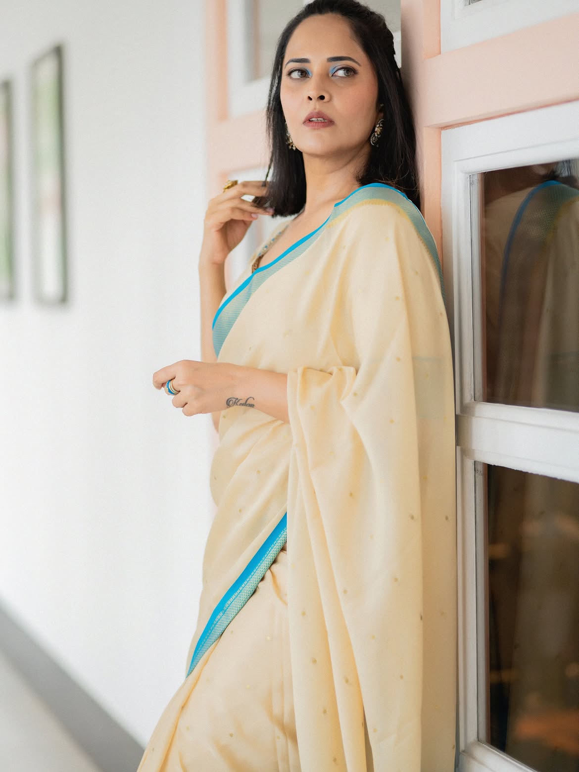 Anasuya Bharadwaj Stunning Looks in White Saree