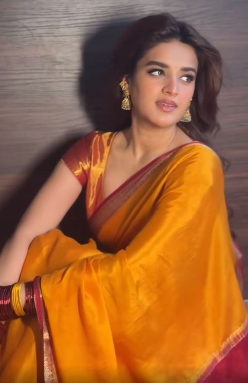 Nidhhi Agerwal fed the cows