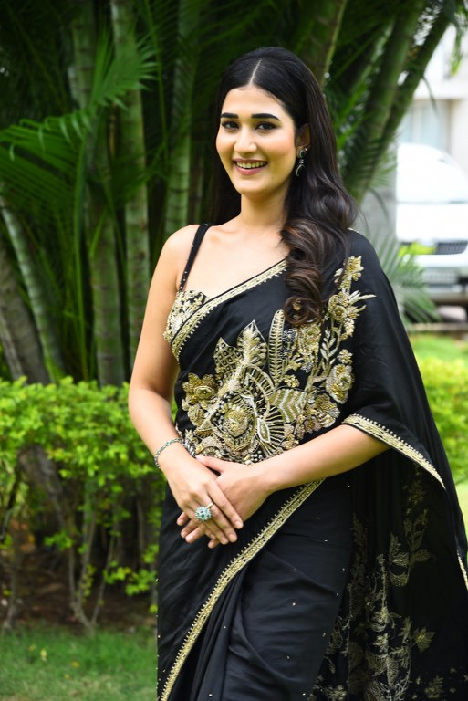 Amrutha Chowdary Stunning Looks in Black Saree