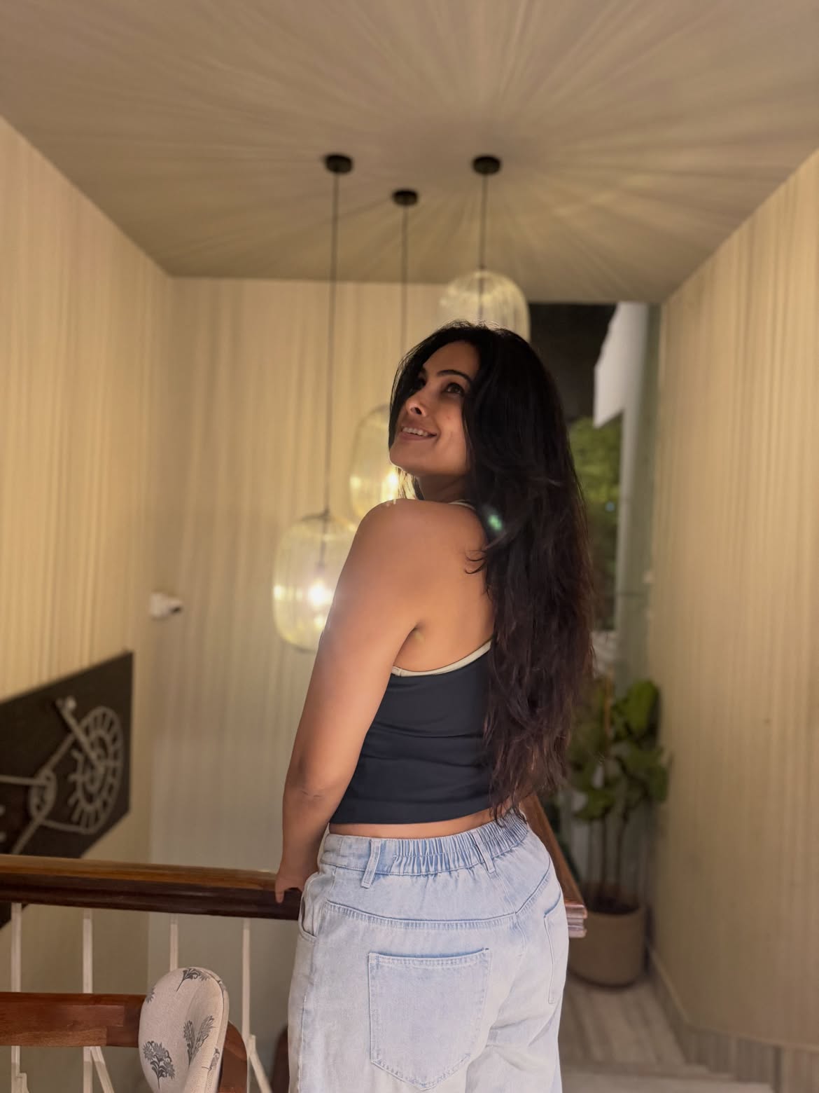Divi Poses in Torn Jeans