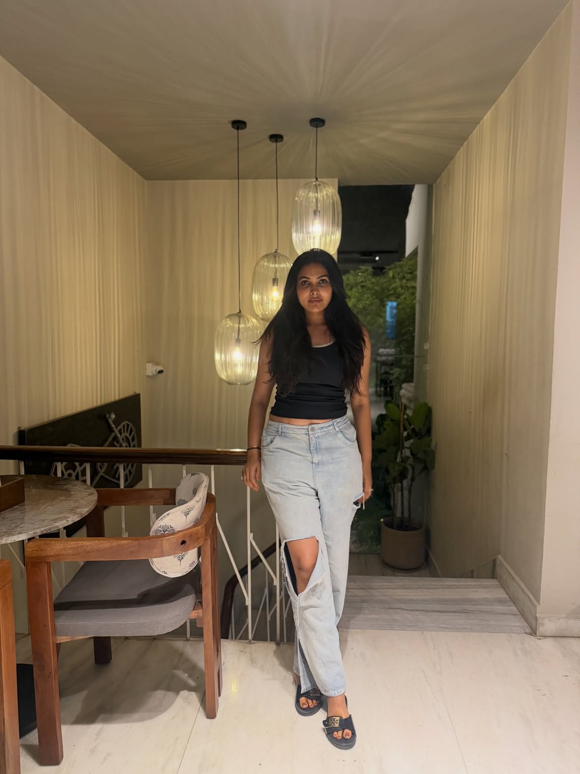 Divi Poses in Torn Jeans