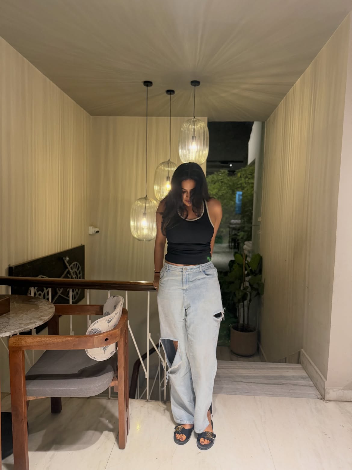 Divi Poses in Torn Jeans