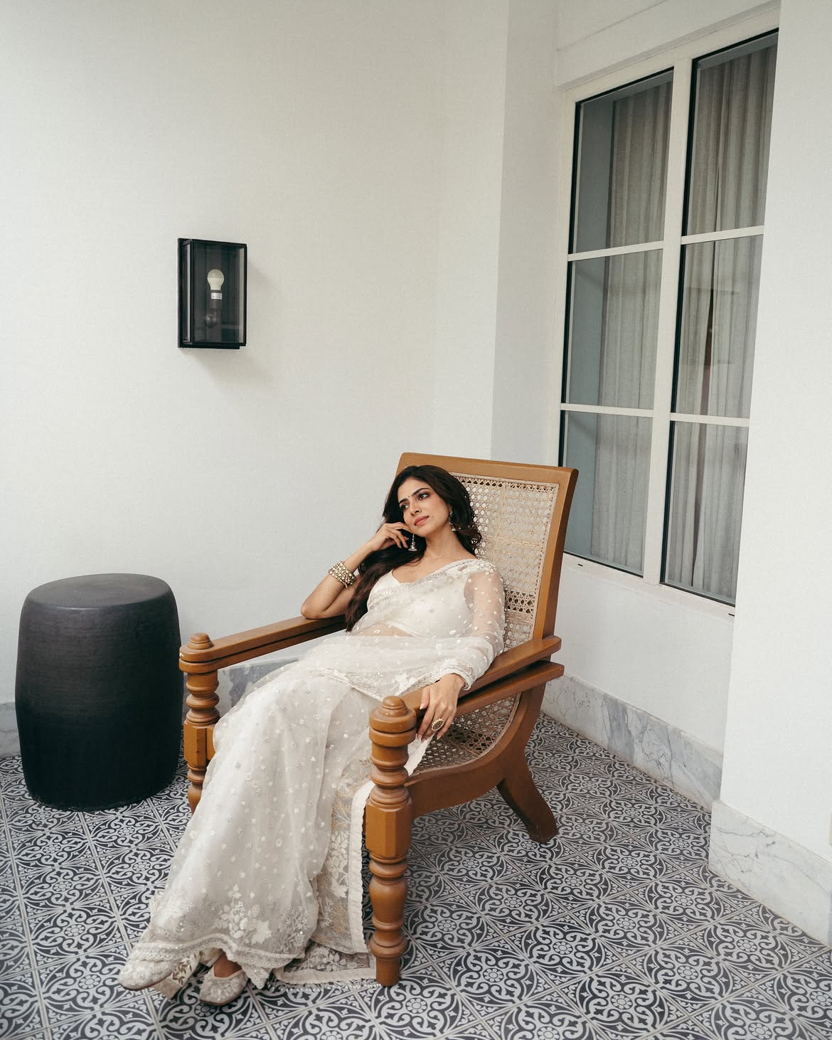 Malavika Mohanan Shows her Beauty in Transparent White Saree